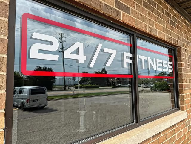 Iron Colosseum 24/7 access signage